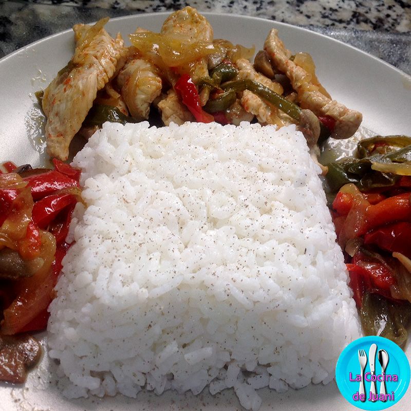 Lomo con pimientos y champiñones