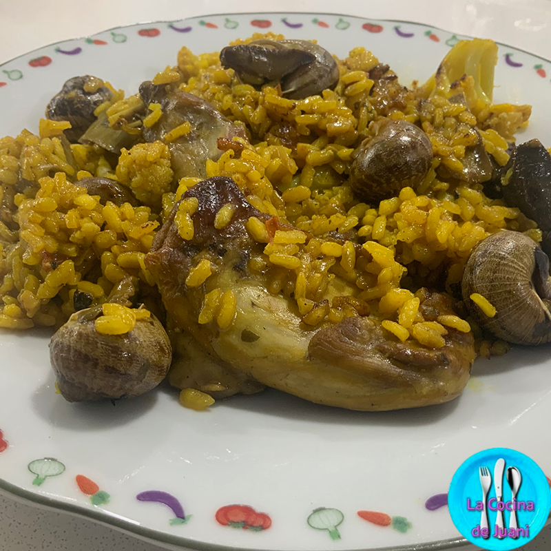 Arroz con pollo y caracoles