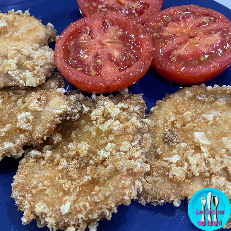 Lomo ibérico crujiente con cortezas y tomates asados