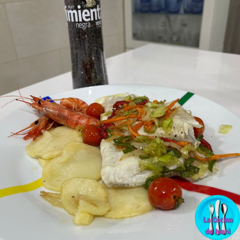 Rodaballo al horno en cama de patatas